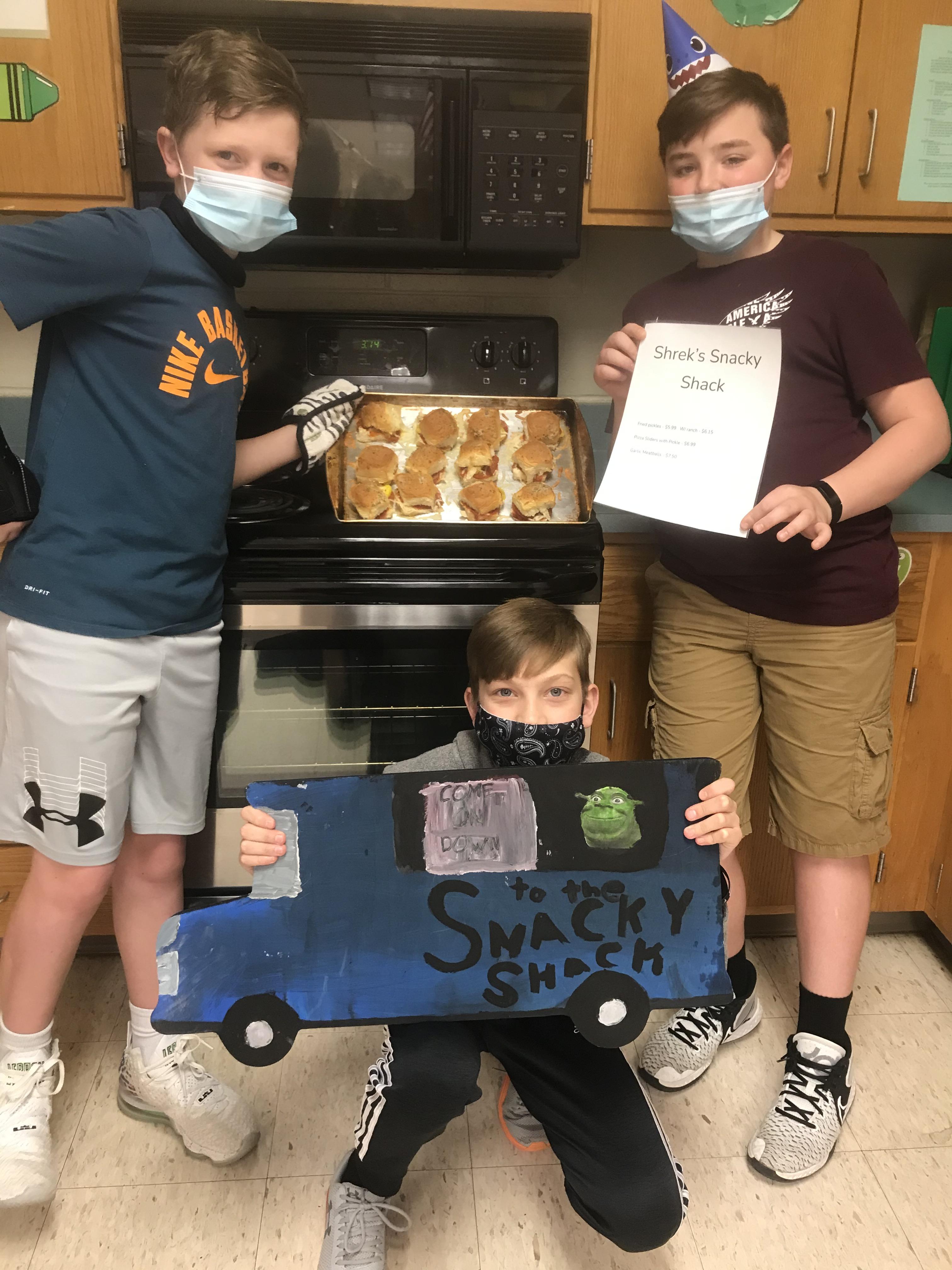 Students with their food truck design