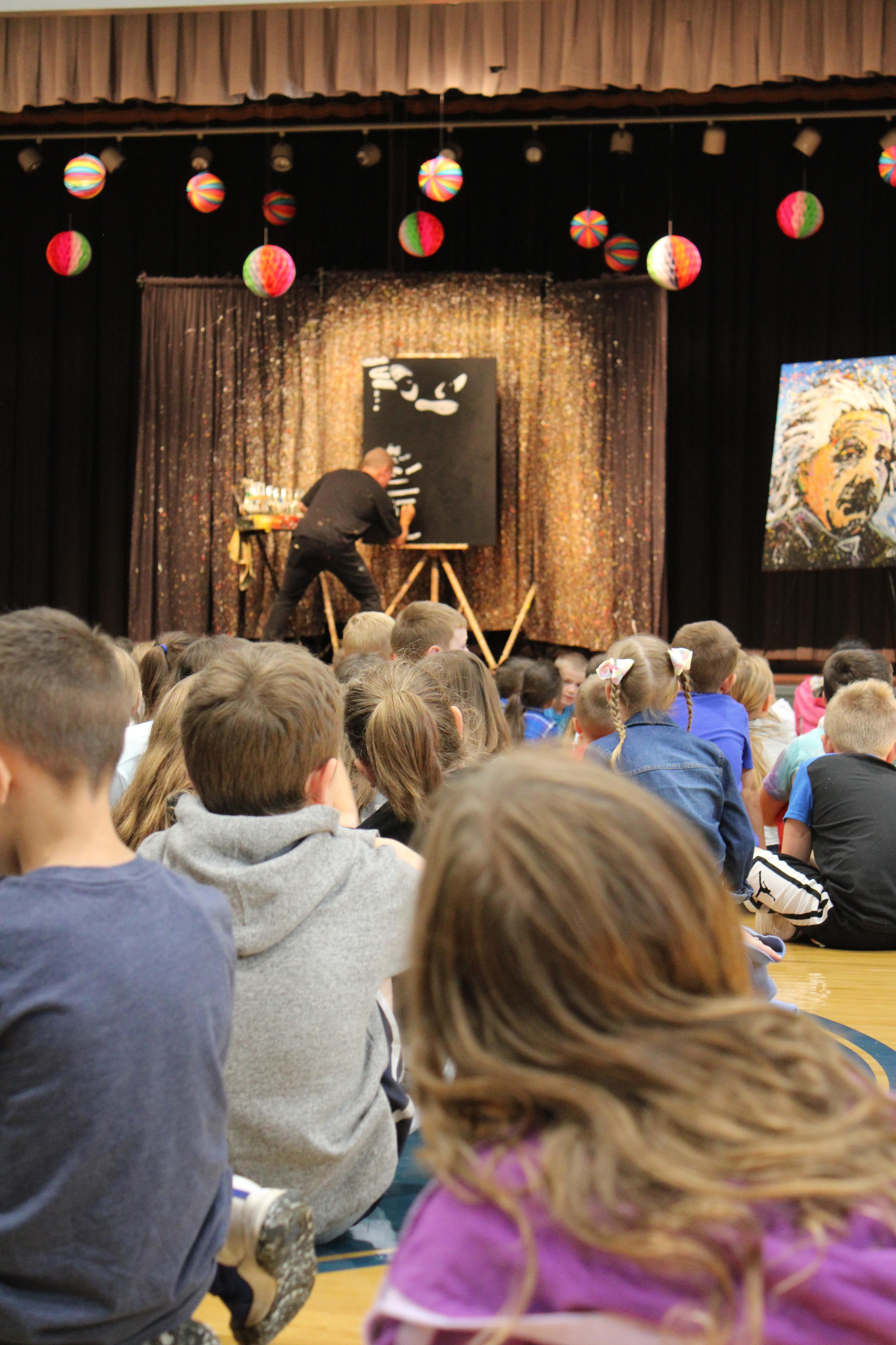 pic of painter entertaining students